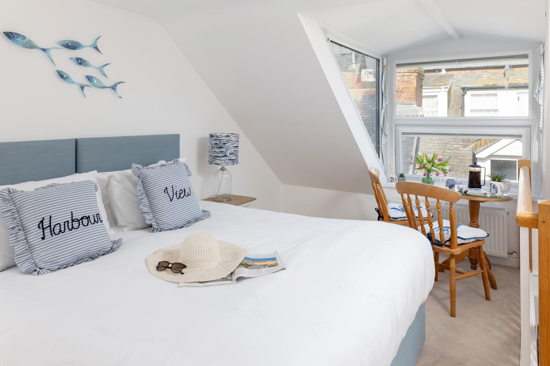 Watch the world go by from the bedroom window. 