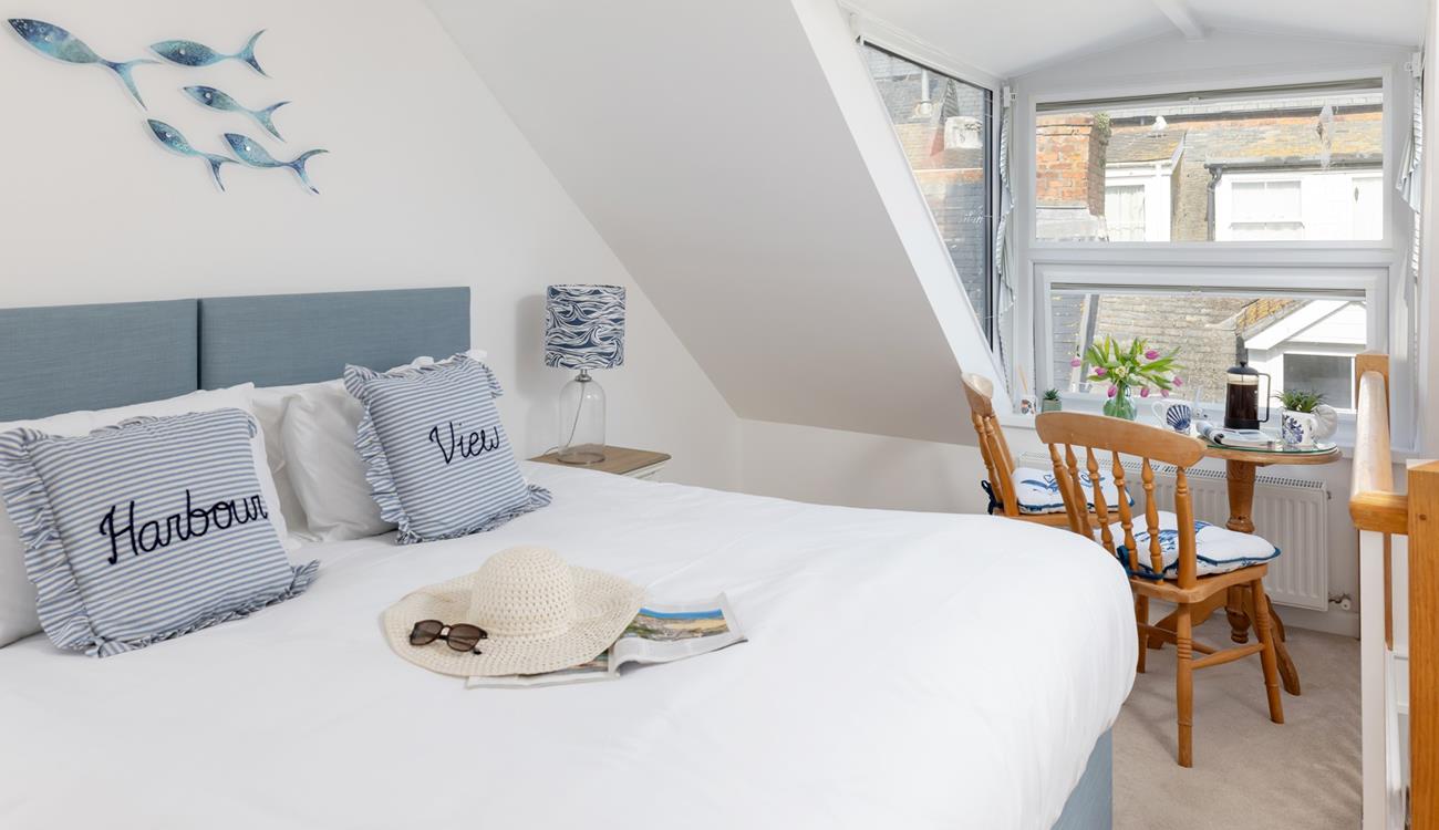 Watch the world go by from the bedroom window. 