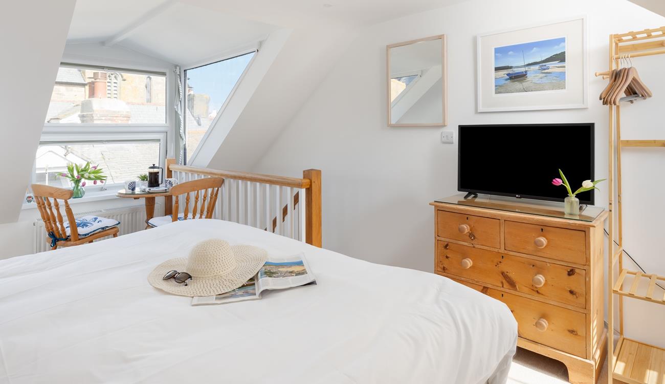 Watch some tv in bed after a busy day walking the streets of St Ives.