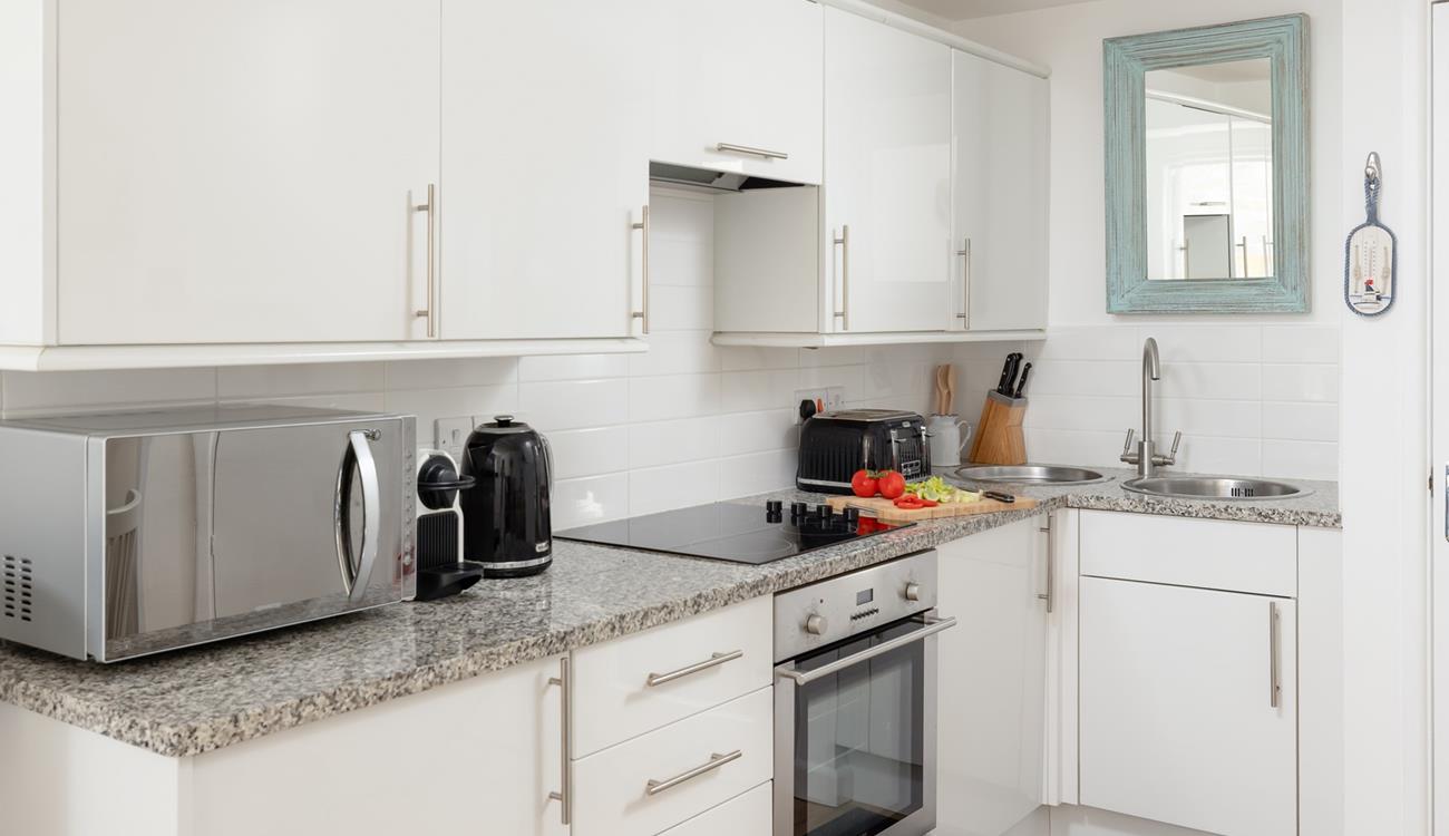 The stylish kitchen makes it easy to whip up delicious home-cooked meals.