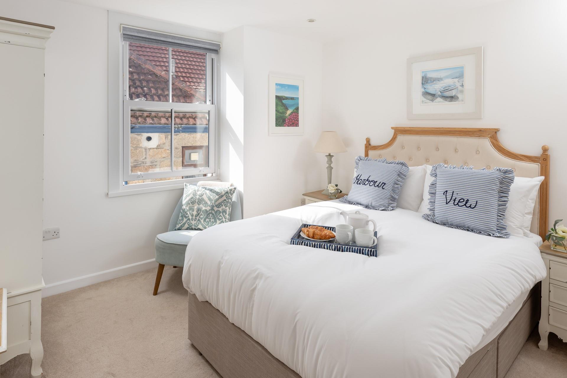 Wake up to sunlight streaming into the bedroom.