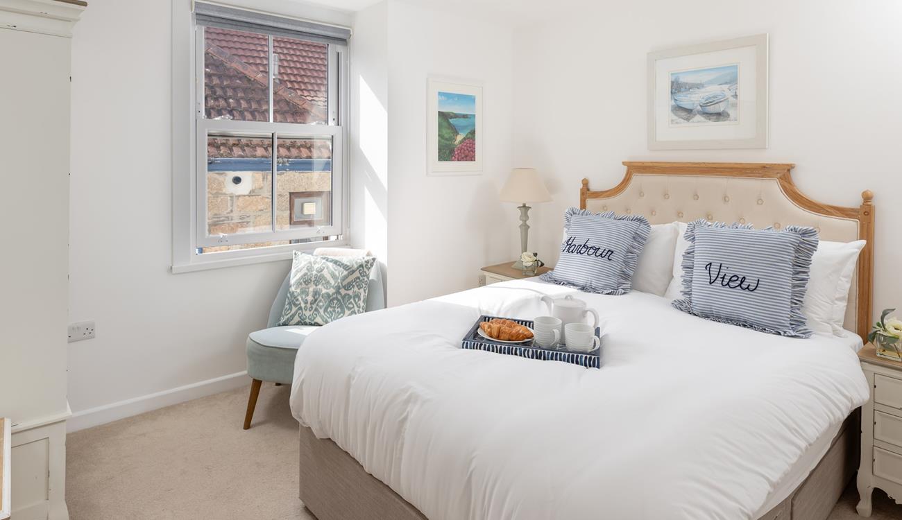 Wake up to sunlight streaming into the bedroom.