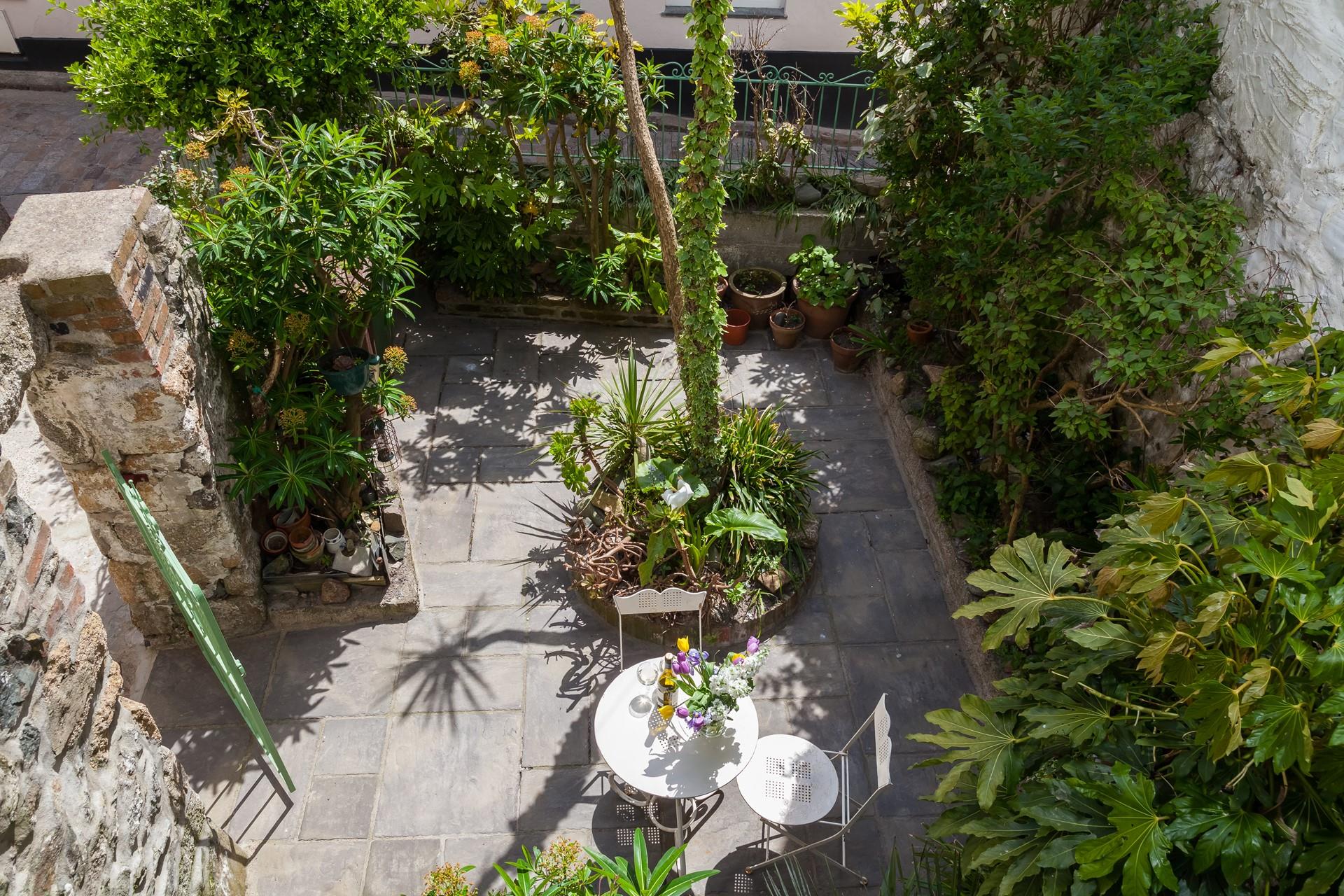 This gorgeous suntrap is very secluded, the most fabulous quiet spot for getting lost in a good book.