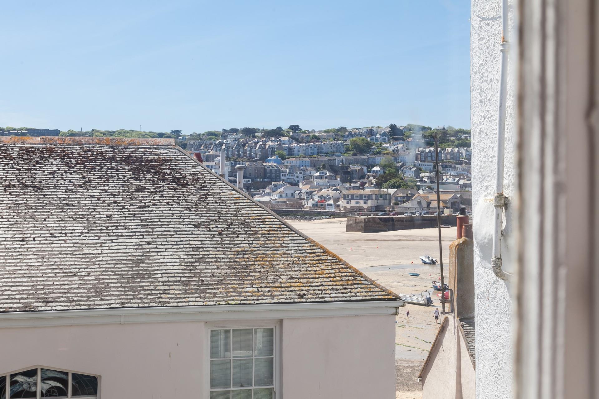 You can catch a glimpse of St Ives Harbour from this splendid property.