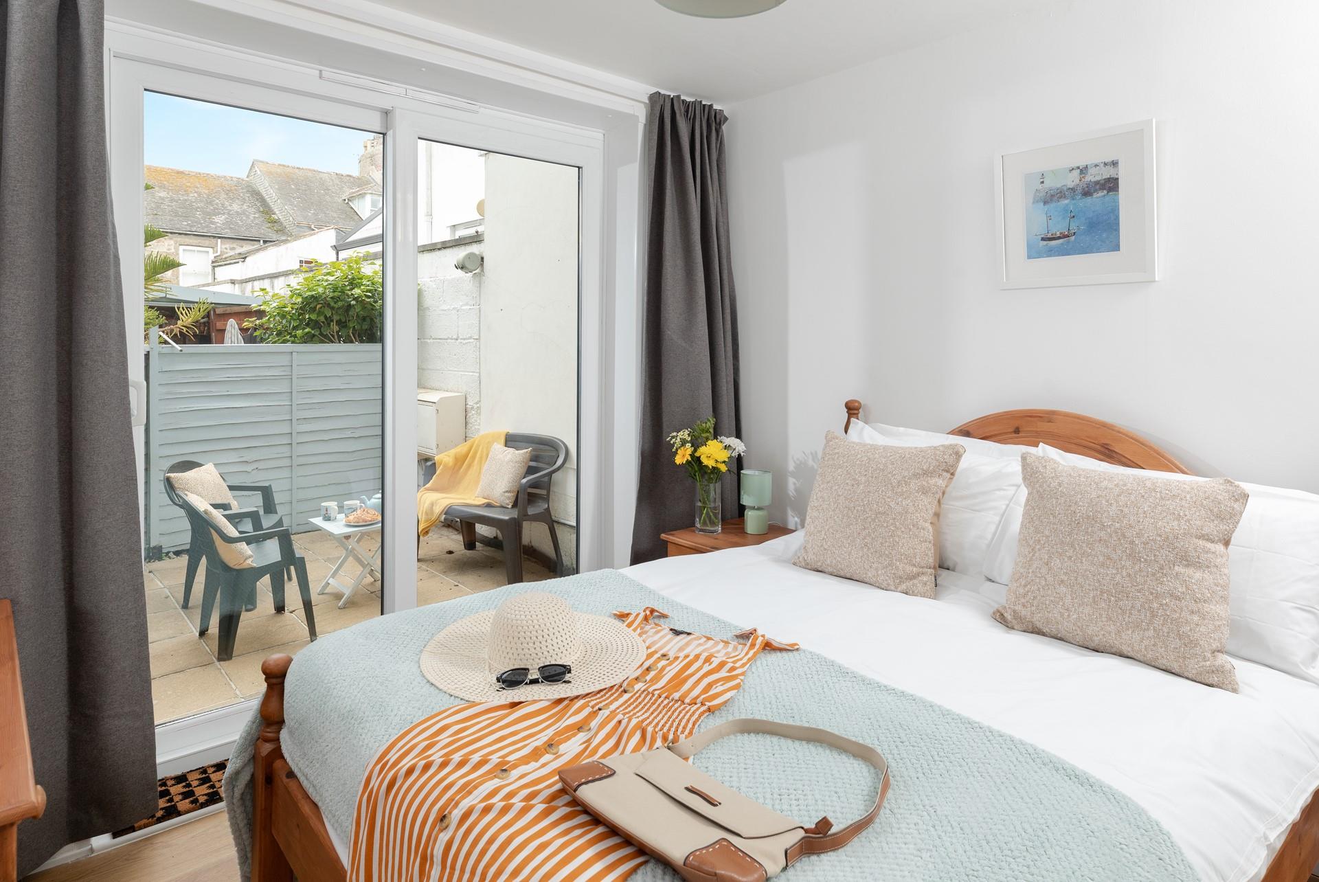 On warm mornings step out of bed and enjoy your first hot drink of the day on the patio area.