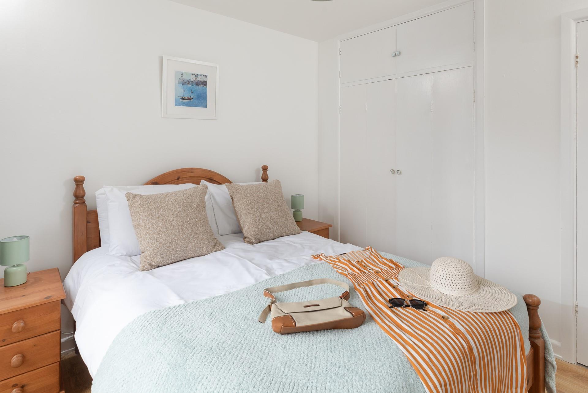 The large, comfortable bed promises a fantastic night's sleep.