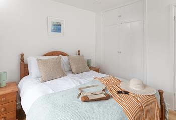 The large, comfortable bed promises a fantastic night's sleep.