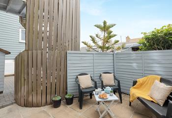 Soak up the sun each morning on the patio.