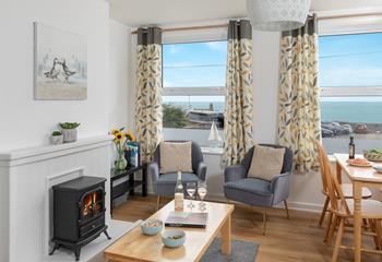 There's an electric fire, two armchairs and a small selection of books, all the ingredients you need for a cosy evening. 