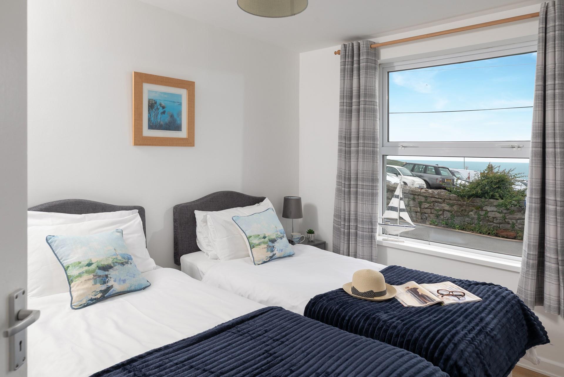 Bedroom 2 benefits from glorious sea views.