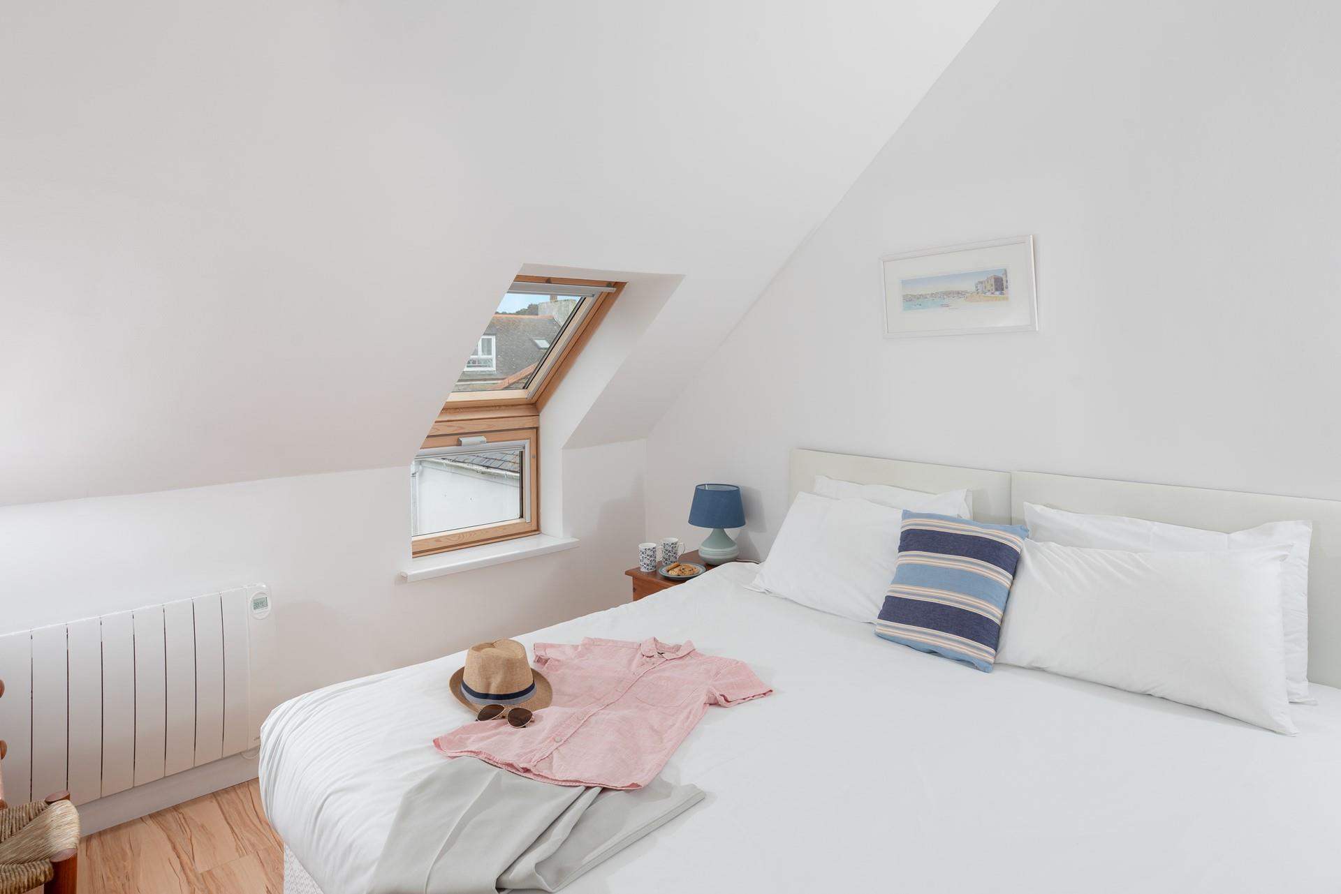 Crisp white linen invites you to snuggle down and drift off.