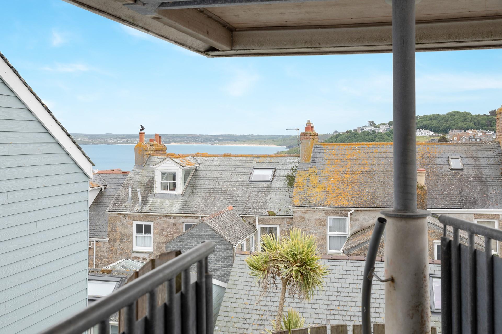 Gaze out at the sea views across the rooftops.