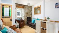The sitting room is filled with character and charm and is the perfect space to relax in the evenings.