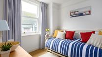 The kids will love the snug room, a space to relax without the adults around.