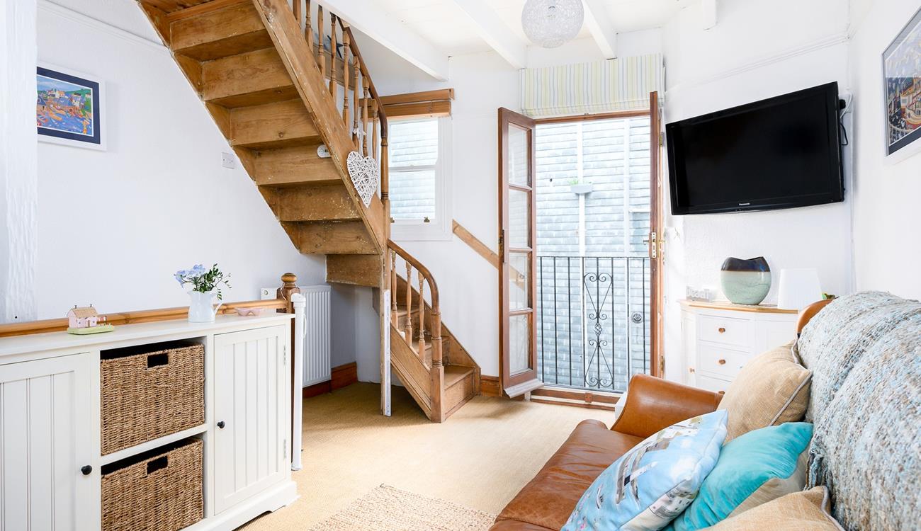 The quirky Juliette balcony means you can let the fresh summer breeze run through the cottage.