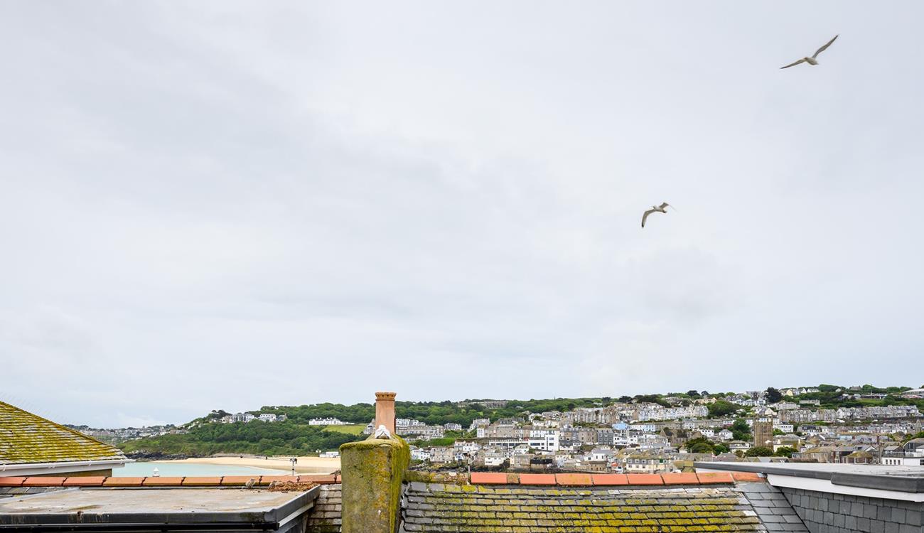 You can catch a glimpse of the sea over St Ives quirky rooftops.