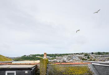 You can catch a glimpse of the sea over St Ives quirky rooftops.