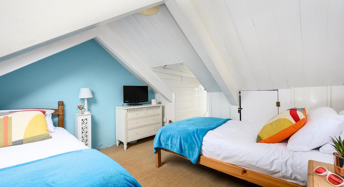 The attic room has twin beds for snuggling up after days spent adventuring.