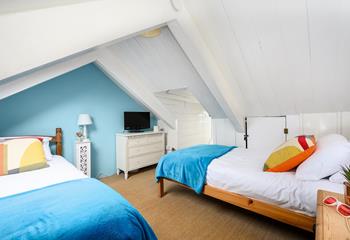 The attic room has twin beds for snuggling up after days spent adventuring.