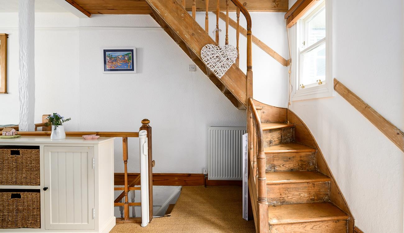 Climb the stairs to bed after a busy day exploring the Cornish coastline.
