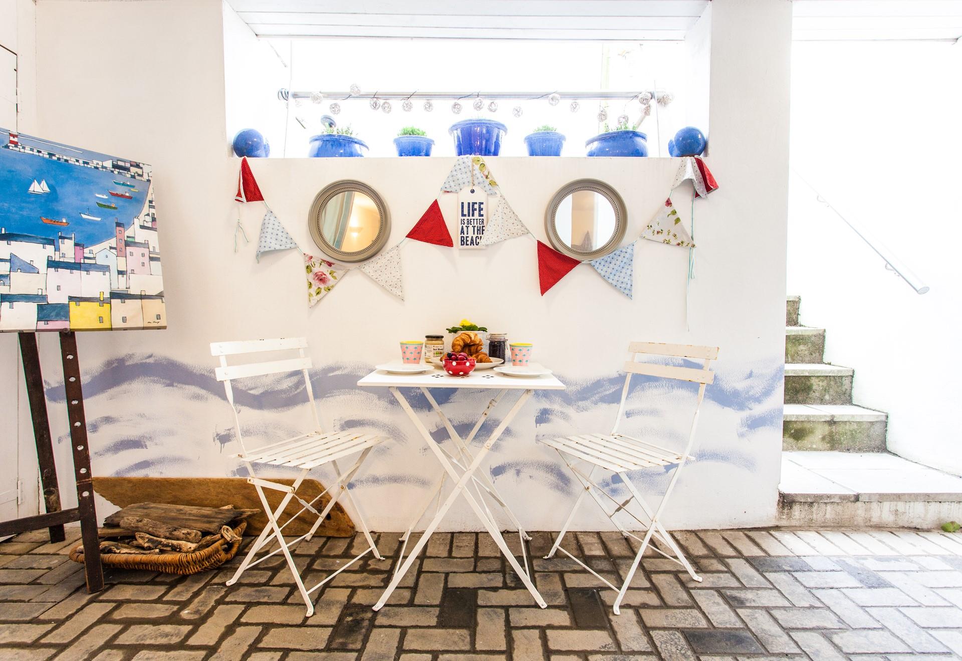 The patio area is just as lovely for evening drinks as it is for breakfast!