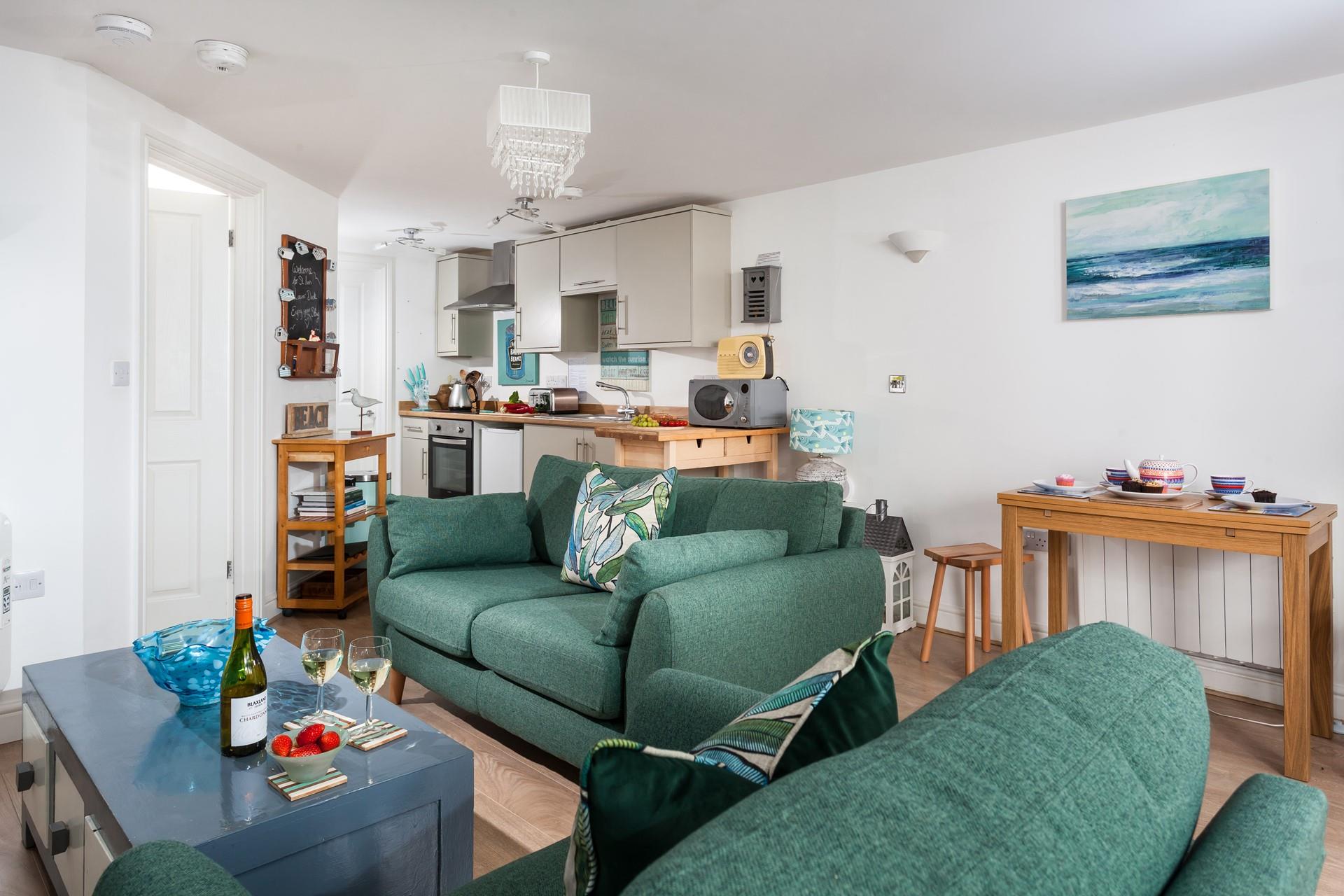 Sink into the sofa in the evening to unwind and pour yourself a glass of something cold.