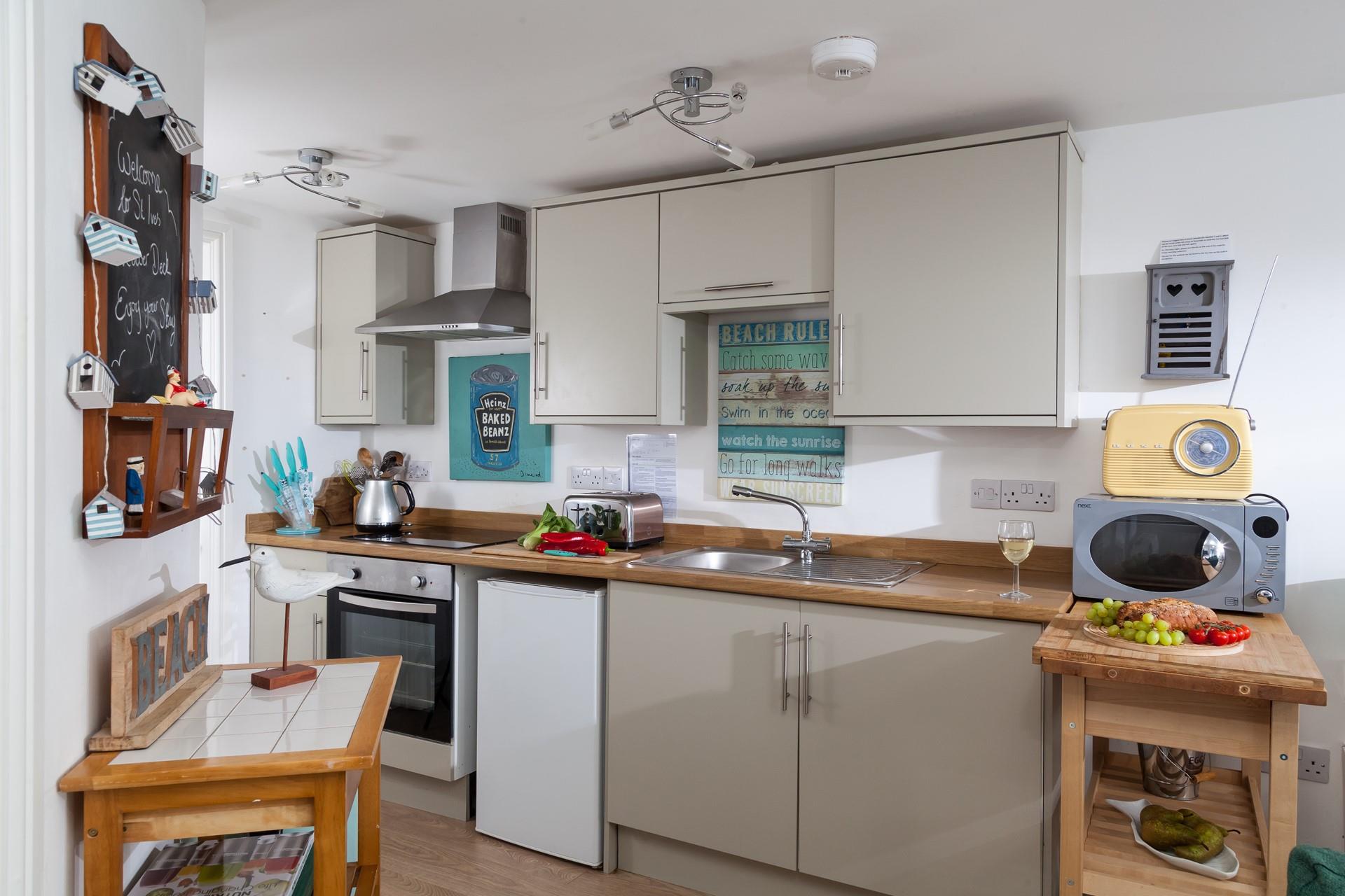 The compact yet well-equipped kitchen is perfect for rustling up delicious meals.