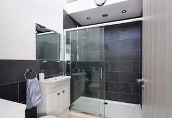 Bedroom 2 has a beautiful en suite with a double walk-in shower.