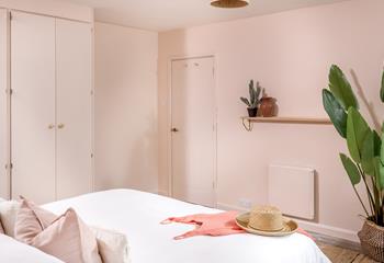 We love the pale pink bedroom, creating a calming space to spend evenings.