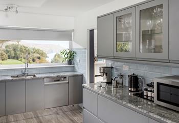 You can even enjoy the stunning sea views whilst washing up! The spacious kitchen has everything you need to prepare a delicious feast. 