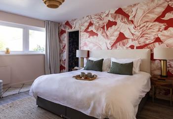 The fifth bedroom has a super king size zip and link bed, with a lovely en suite shower room.