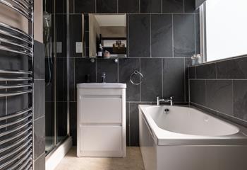 There's also a bath in the en suite, perfect for soaking after a day walking the coast path.