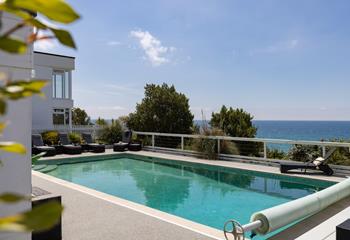 Soak up the sun by the pool whilst taking in the view!