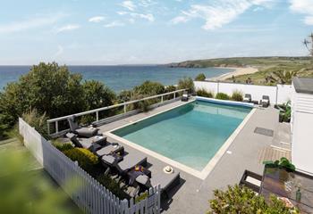 Spend your days relaxing by the heated beachside pool!