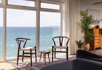 Treat yourself to a glass of something chilled, with the ocean as your backdrop.