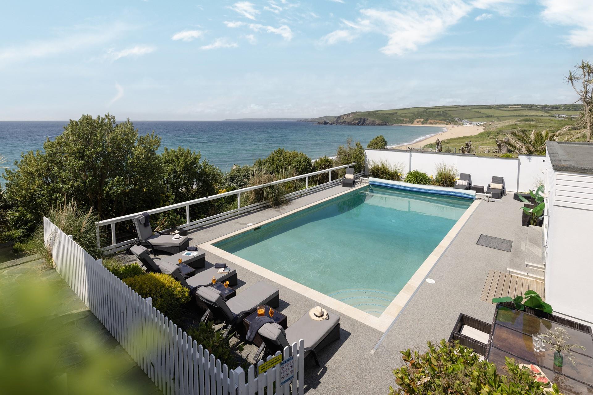 Relax by the pool whilst taking in the view!