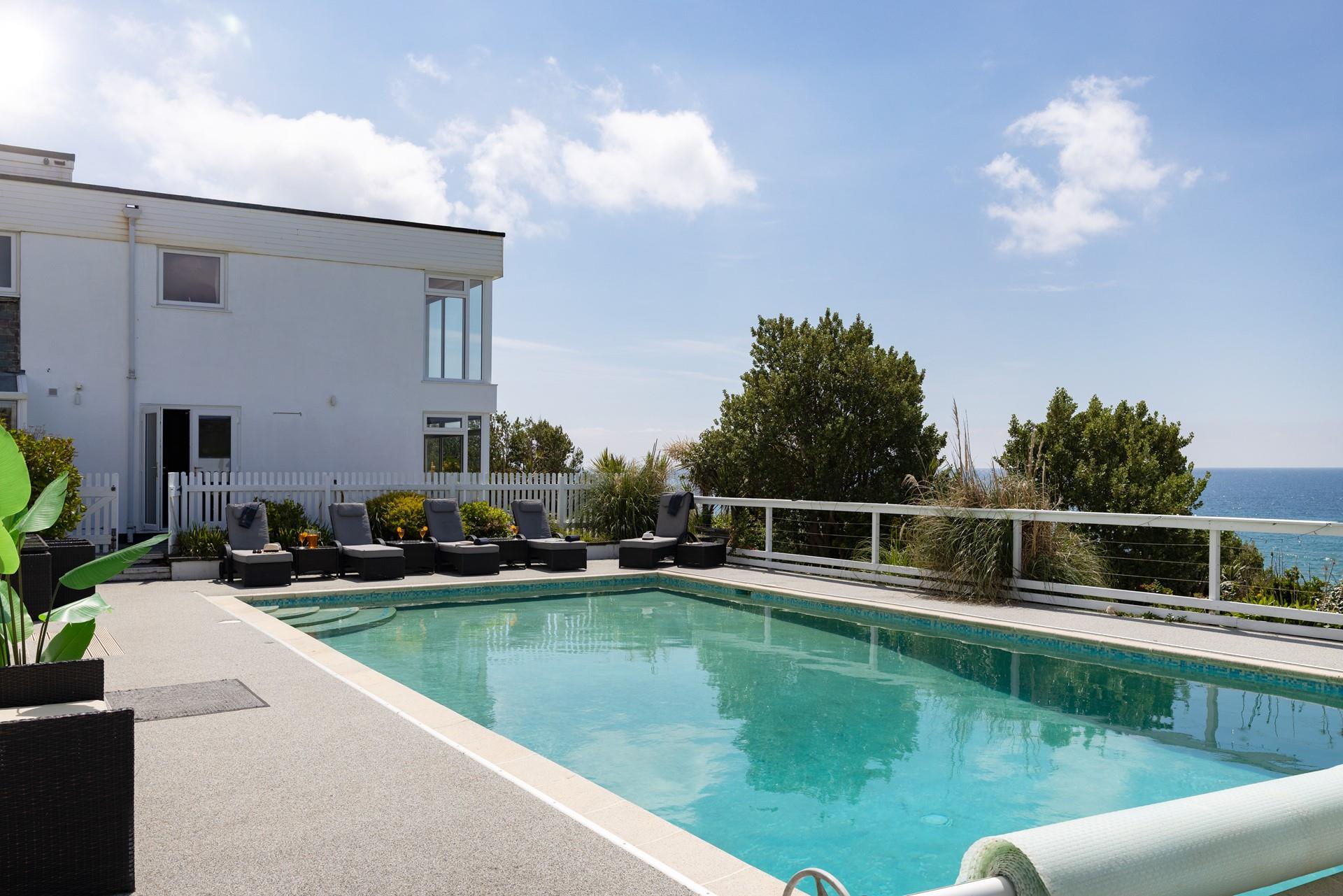 Unwind on the sunloungers in between dips!