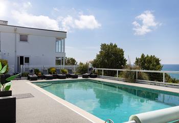 Unwind on the sunloungers in between dips!