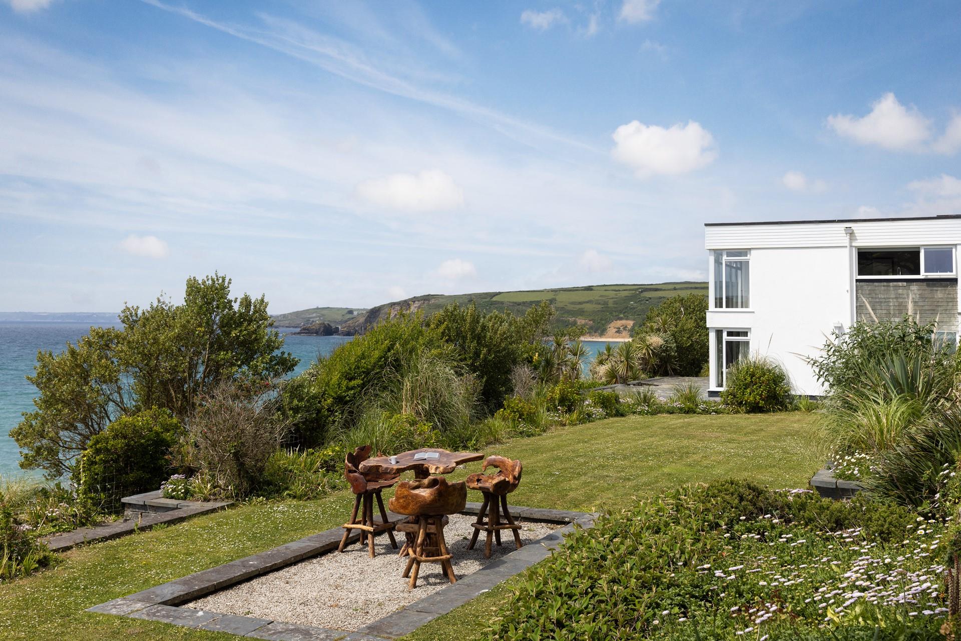 Overlooking the beach, this spacious garden is beautifully landscaped with lots of tranquil corners to explore.