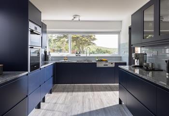 You'll fine all the mod cons you need, including an American style fridge with ice maker, coffee machine, and wine fridge!