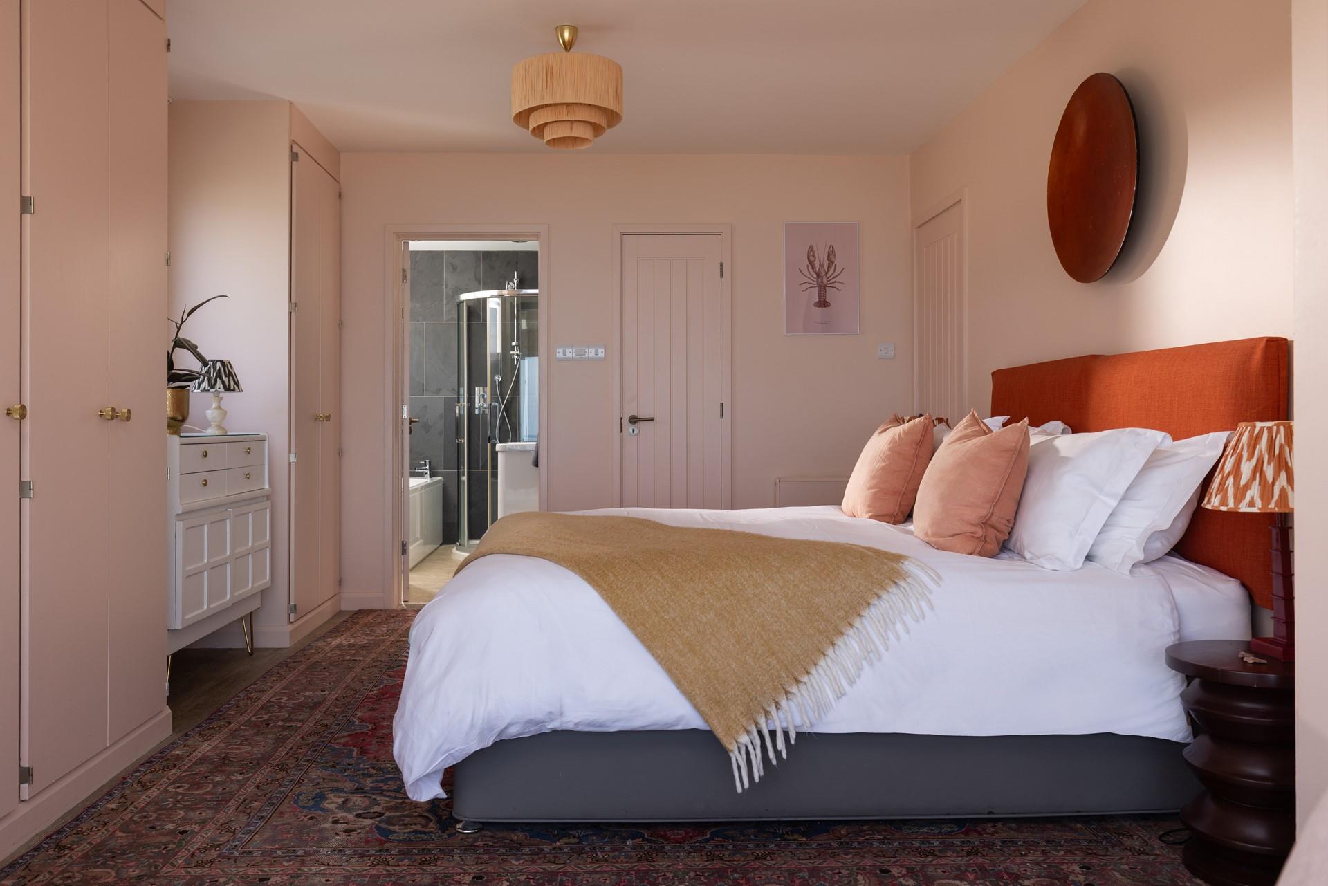 Settle into the soft sheets of your super king size bed for a dreamy night's sleep.