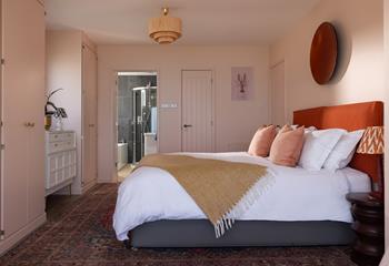 Settle into the soft sheets of your super king size bed for a dreamy night's sleep.