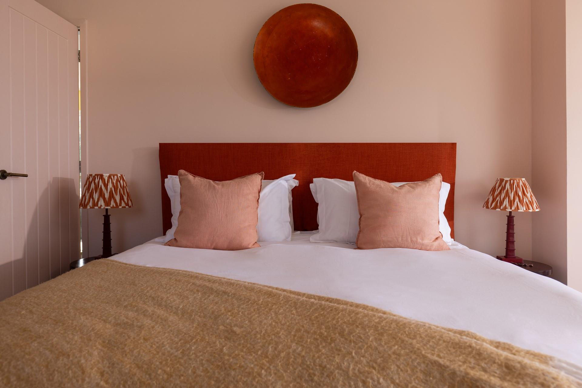 The pale hues create a calming bedroom where you'll sleep soundly.