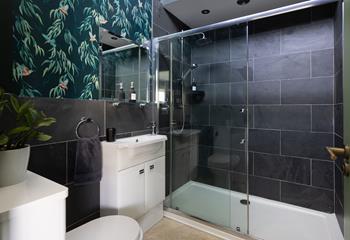 Bedroom 2 has a beautiful en suite with a double walk-in shower.