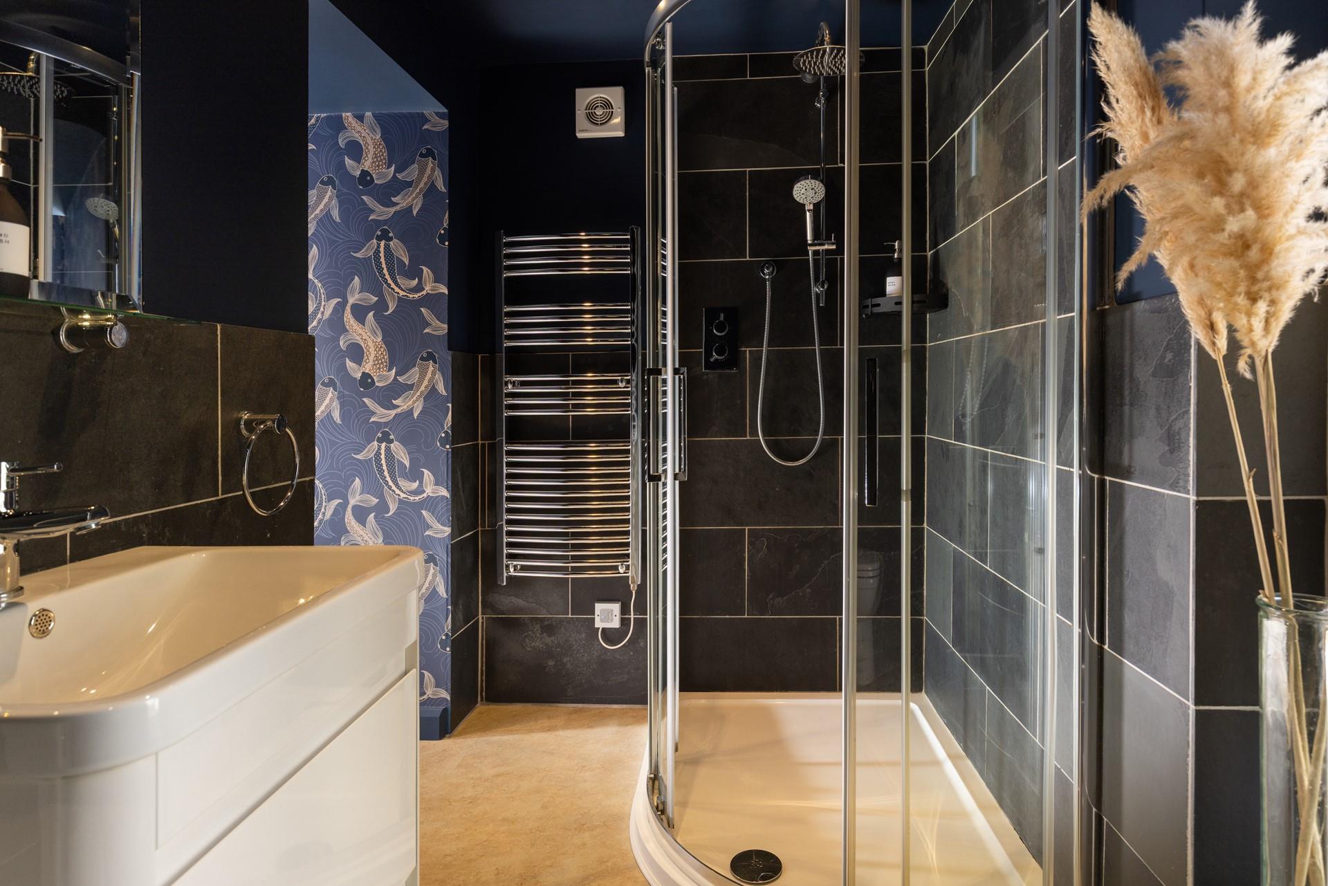 Bedroom 5 has a stylish en suite shower room. 