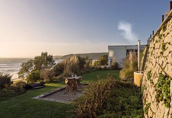 Tucked away in the scenic gardens is a luxurious wood-fired hot tub. 