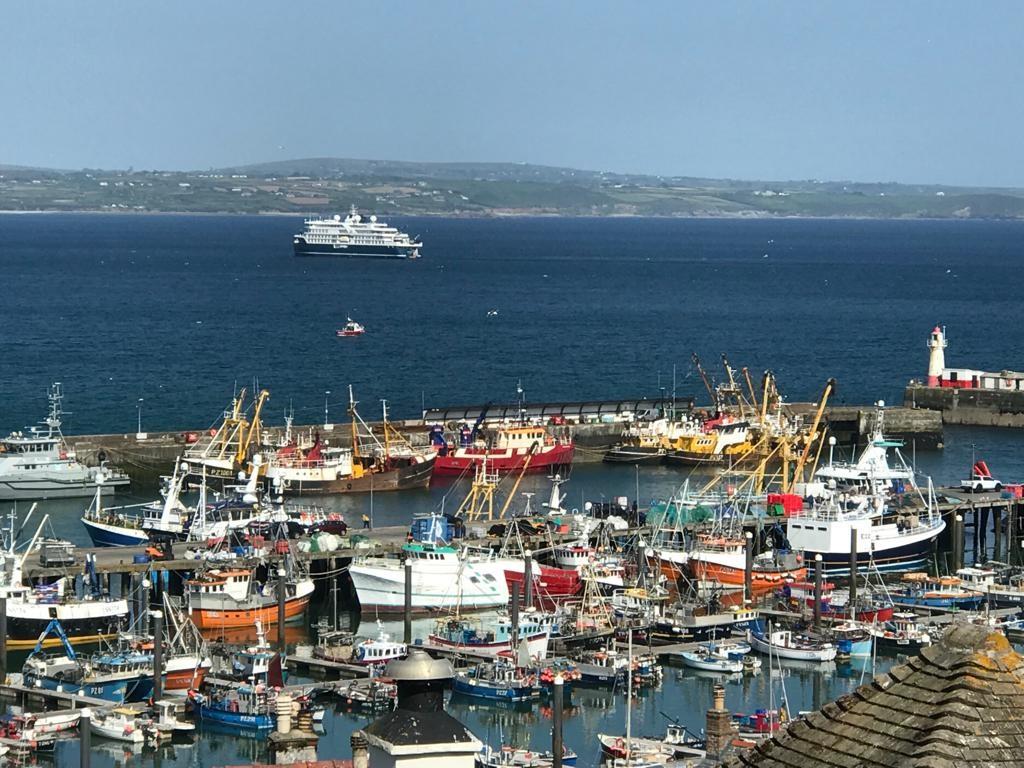 Head into Newlyn and enjoy coffee and cake from a local cafe.