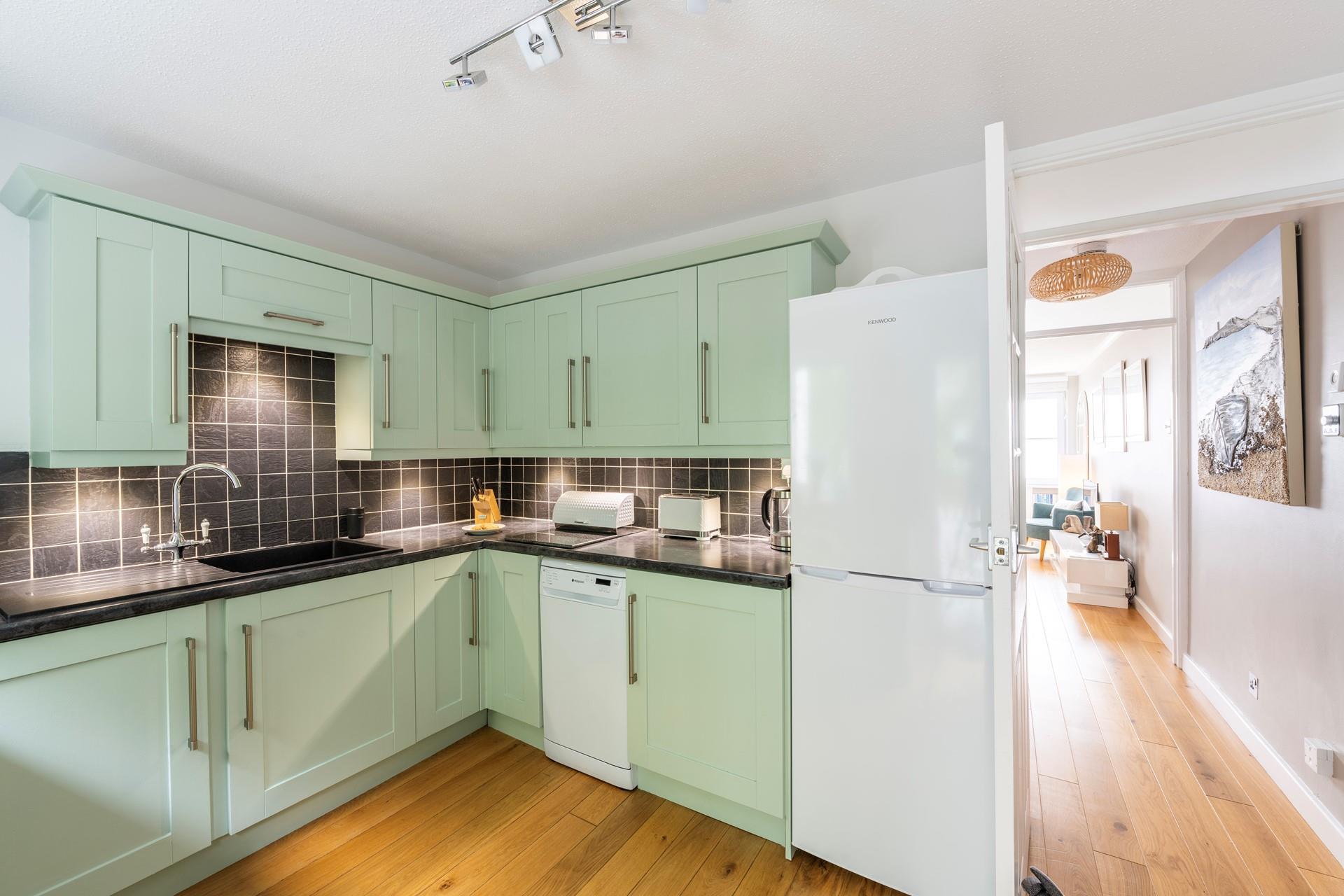 The kitchen is modern and has all the appliances you need to cook a tasty feast.