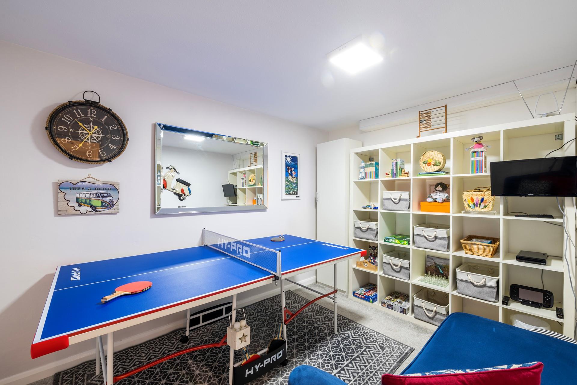 The games room is equipped with a table tennis table, TV and Wii, a selection of games and a sofa. Perfect for those rainy days!