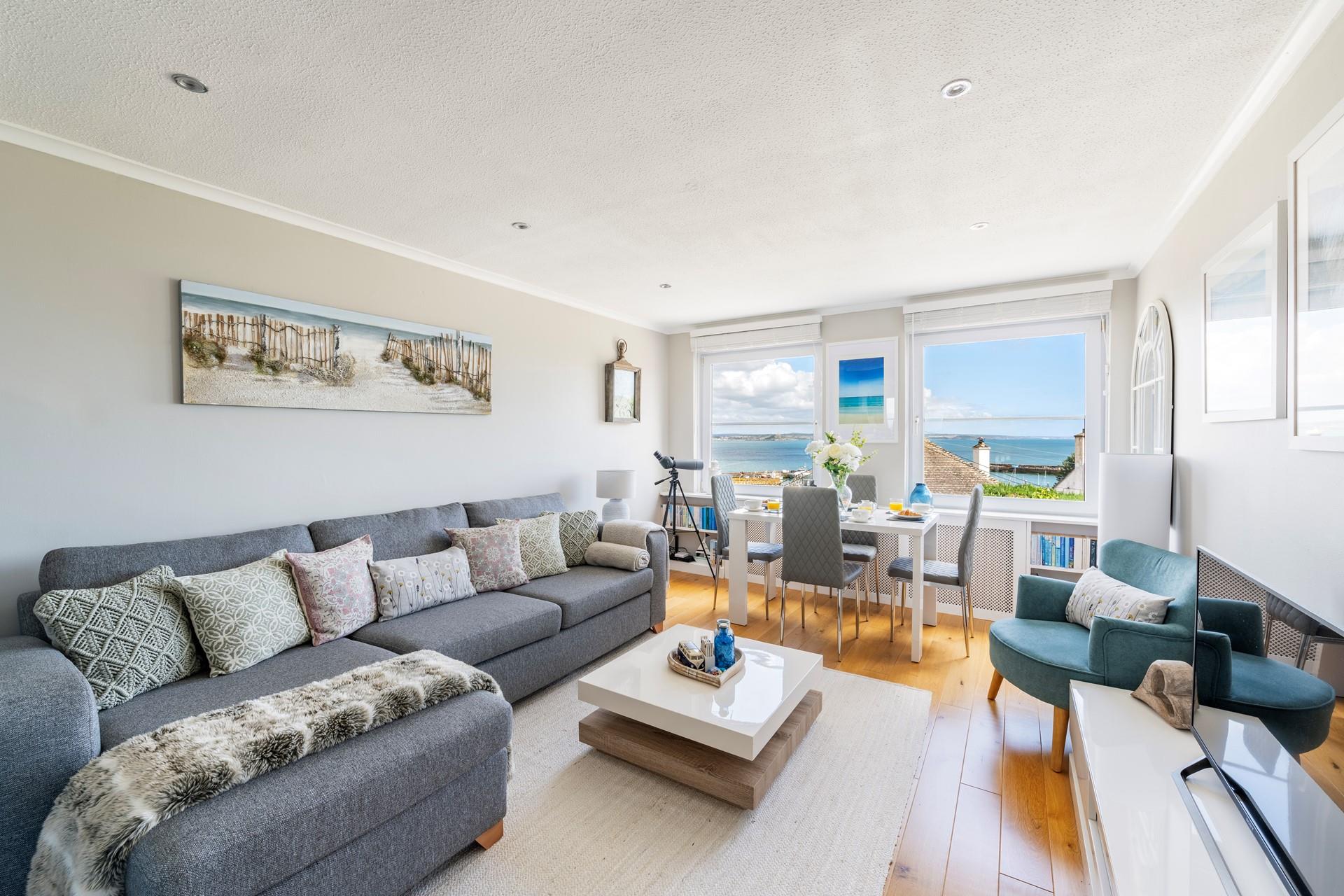 The large corner sofa in the living room is perfect for a lazy night in.